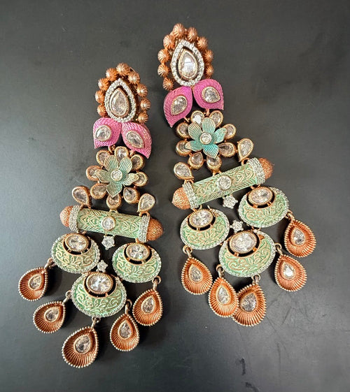 Pair of Jhumkaas with floral and teardrop designs