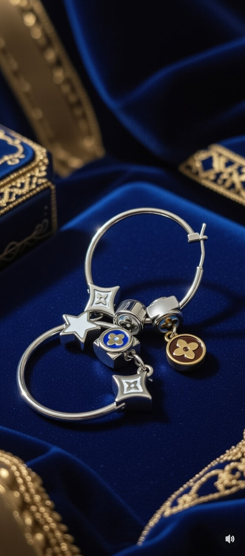 Silver hoop earrings with charms