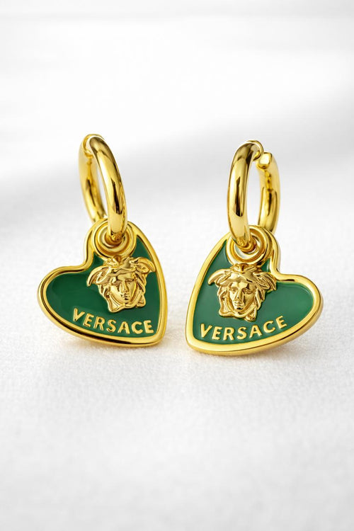Versace earrings with green heart-shaped pendants