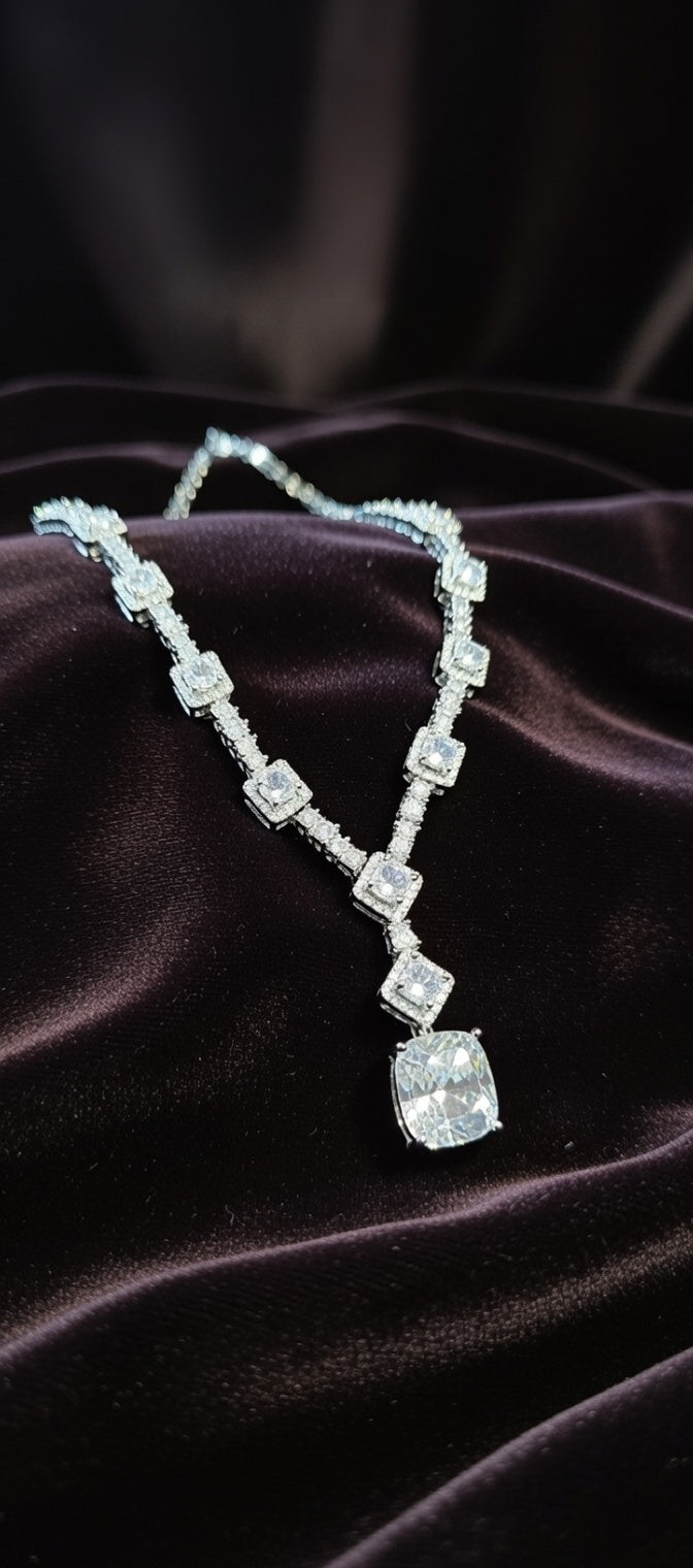 Diamond necklace on a dark fabric background