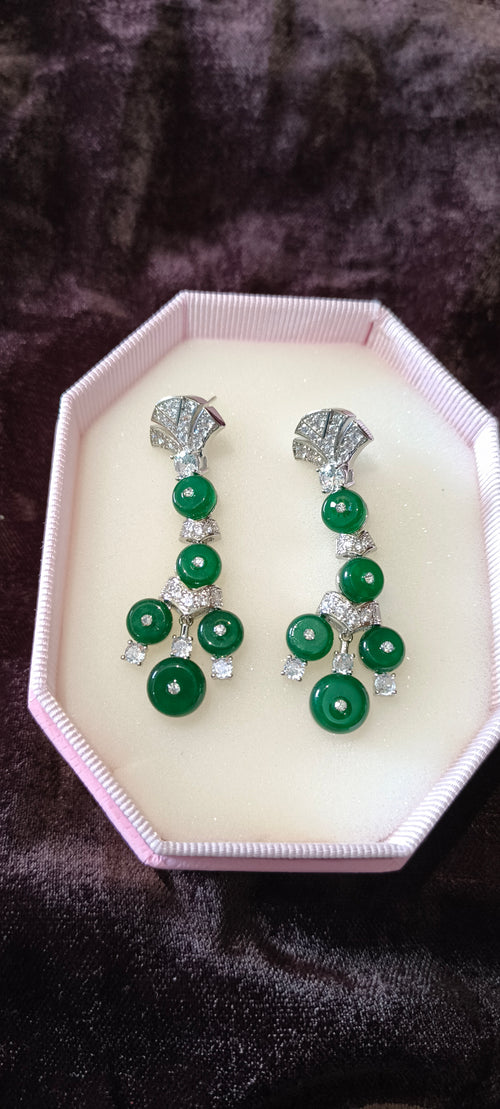 Pair of green gemstone earrings
