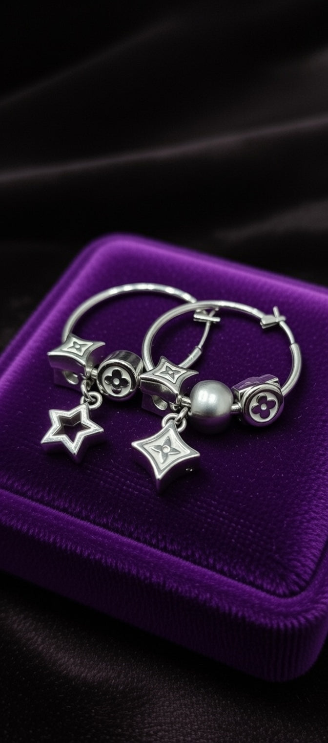 Silver hoop earrings with charms 